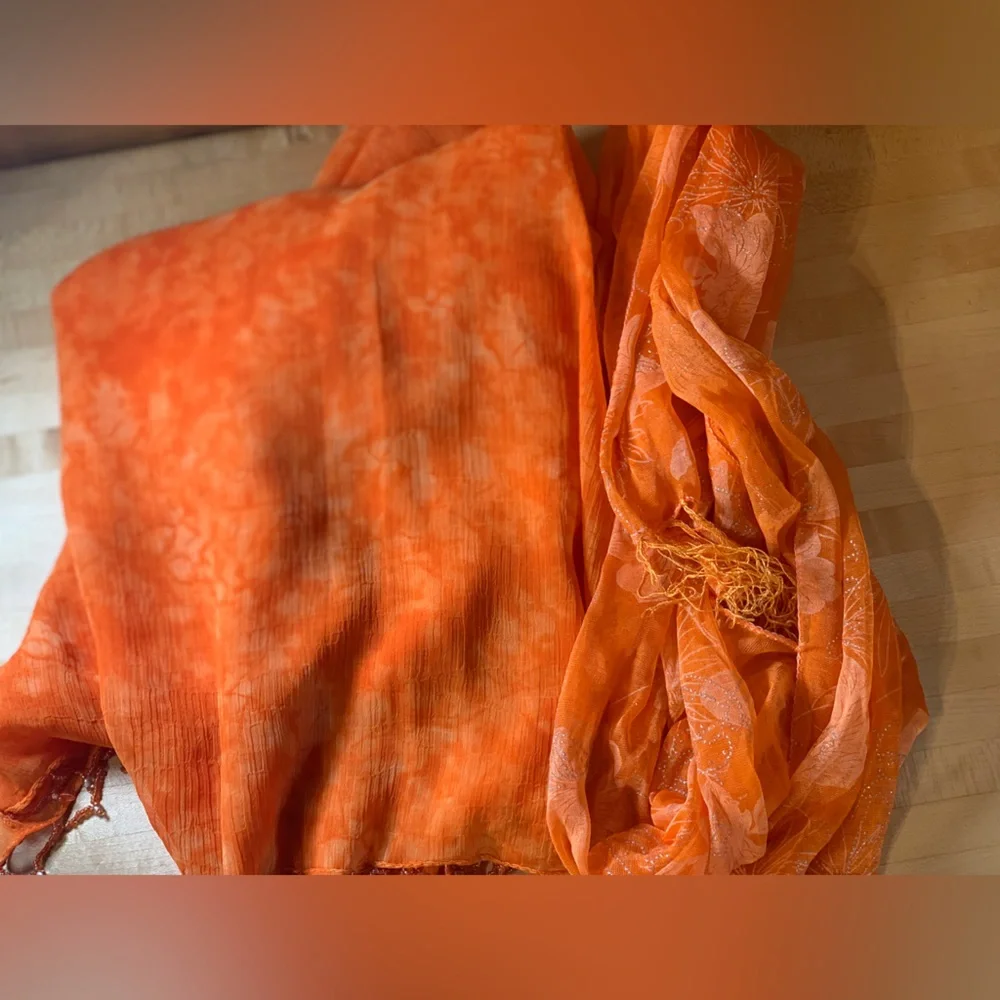 2 beautiful orange scarves‎ bundled. One with beading, then other with sparkle.